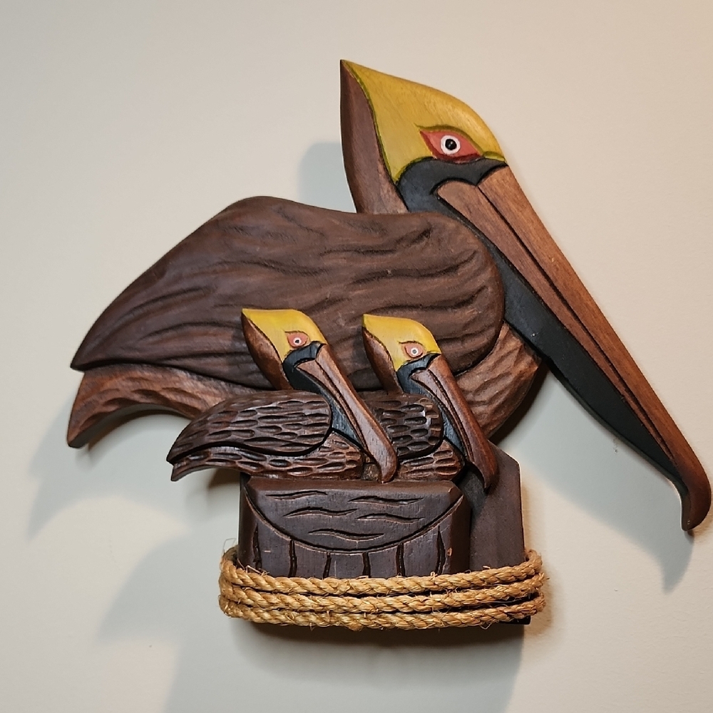 Brown and Yellow Pelican Sculpture with Large Beak And Two Baby Pelicans